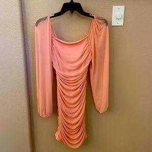 Blush pink ruffled short dress with long sleeves